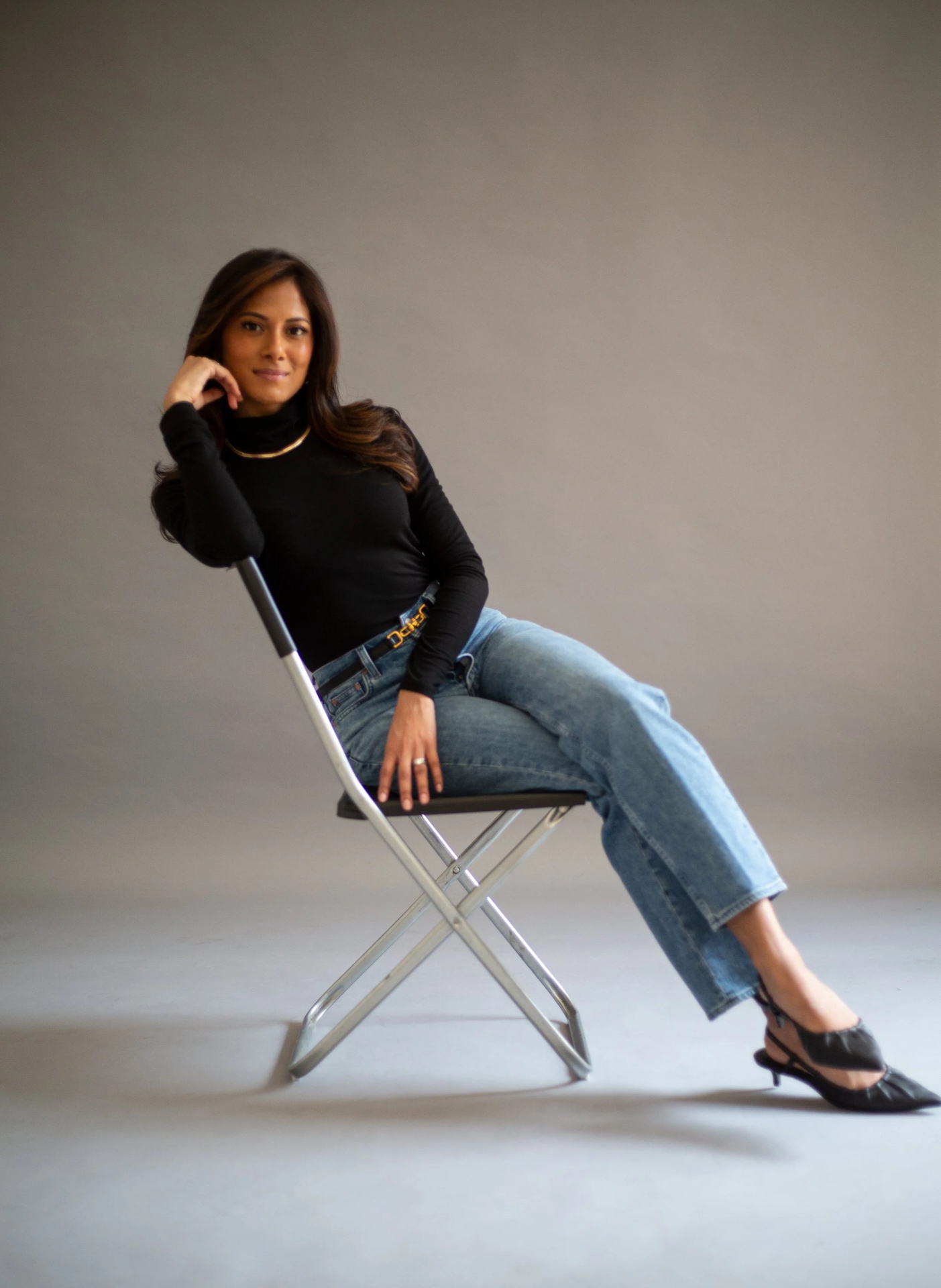 Israa Nasir seated in studio portrait